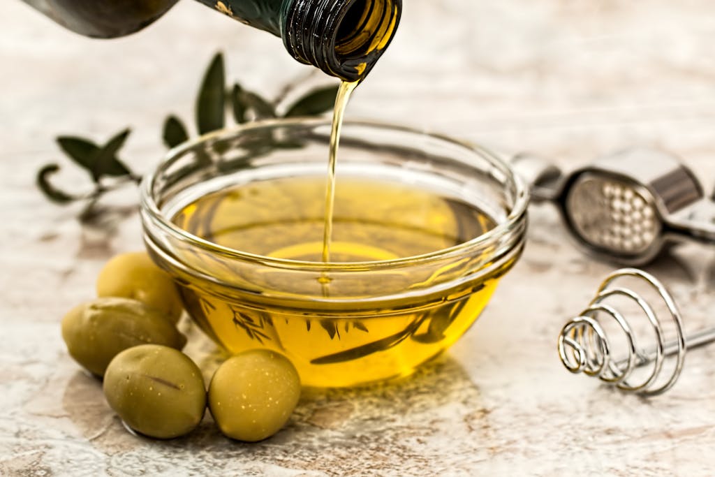 Bowl Being Poured With olive oil